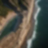 Aerial view of a dynamic coastline showcasing erosion and sediment deposition